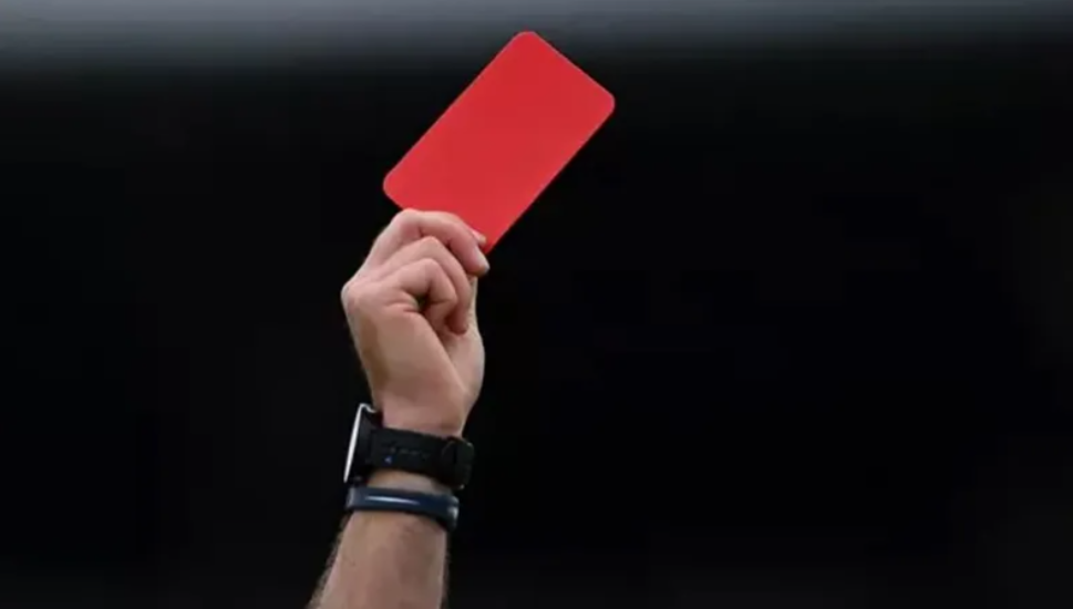 A rare incident on a football field, referee shows a red card to a spectator